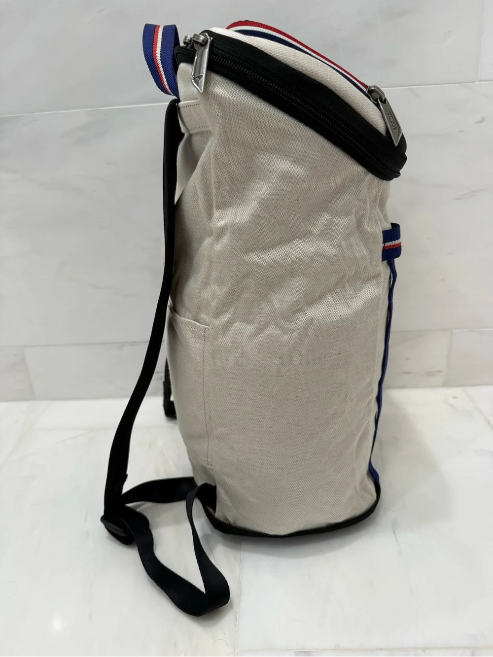 Tumi up sale